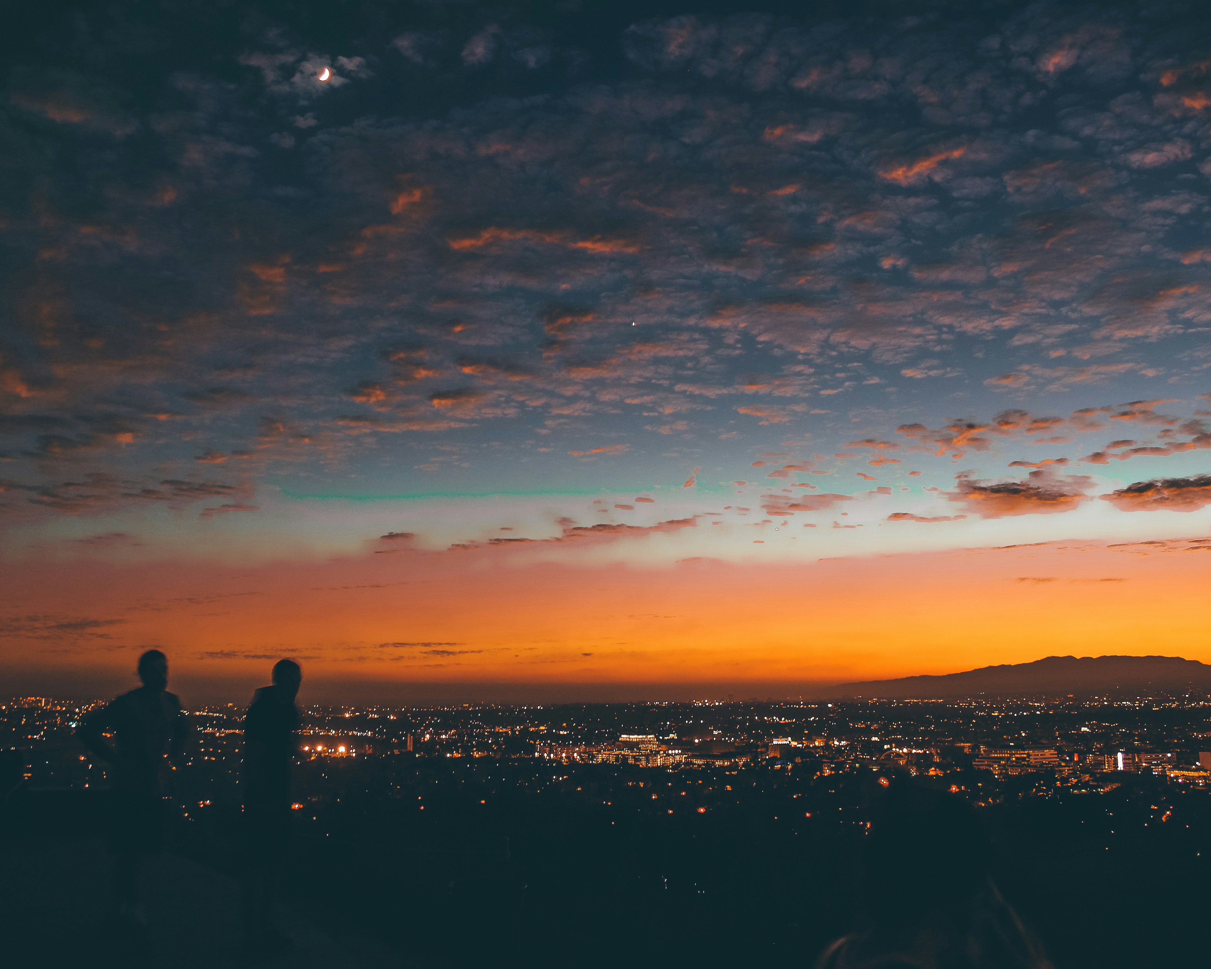 silhouette of two persons